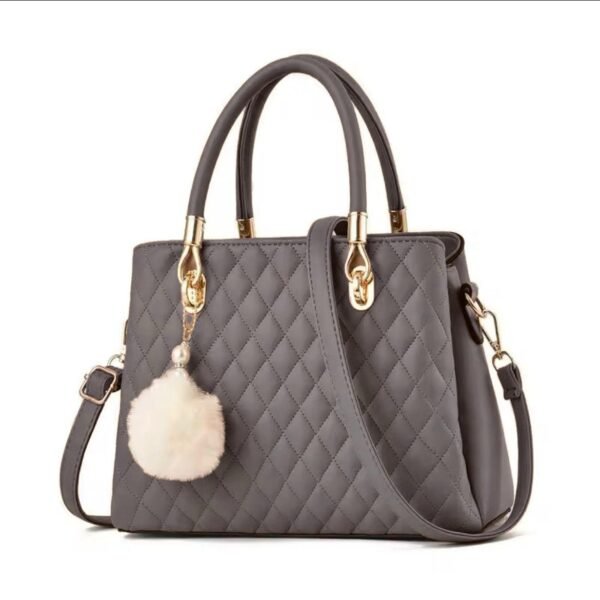 Chic Quilted Leather Top-Handle Satchel with Pompon Charm - Image 9